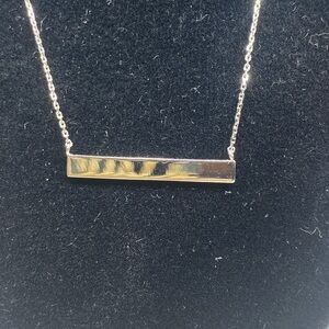 Sterling silver engraveable bar pendant.